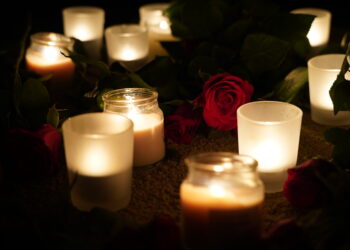 Community vigil shows solidarity against domestic violence