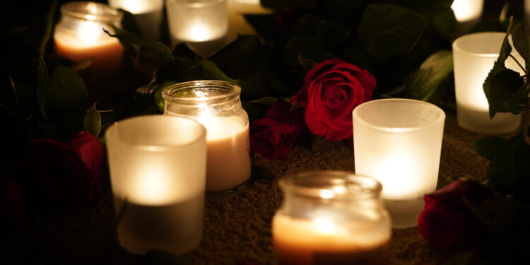 Community vigil shows solidarity against domestic violence